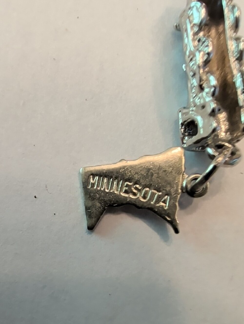 Vintage Silver Tone Minnesota Train Charm with Tag - Picture 3 of 5